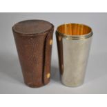 A Vintage Leather Cased Set of Five Stacking Drinking Cups, the Case Monogrammed HTE, 14cm high