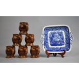 A Set of Six Woods Treacle Glazed Mugs in the Form of Elephants together with a Blue and White