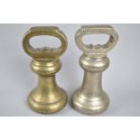 Two Vintage Cast Metal Bell Weights, both 7lbs the Brass Example with Victoria Stamp, the Other