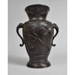 A Japanese Bronze Vase with Flared Neck to Baluster Body Having Twin Elephant Head Stylised