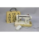 An Electric Jones 451 Sewing Machine with Power Cable and Foot Pedal, untested