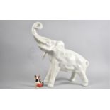 A Large White Glazed Ceramic Study of an Elephant Together with a Goebel Rosina Wachtmeister Cat