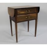 A Mid 20th Century Two Drawer Occasional Table in Walut with Drop Leaves and Set on Tapering