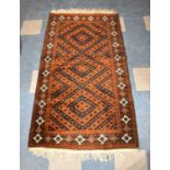 An Antique Hand Made Persian Balouch Rug, 192x107cms