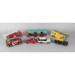 A Collection of Dinky and Corgi Diecasts to Include Fire Engines, Horse Transporter, Police and