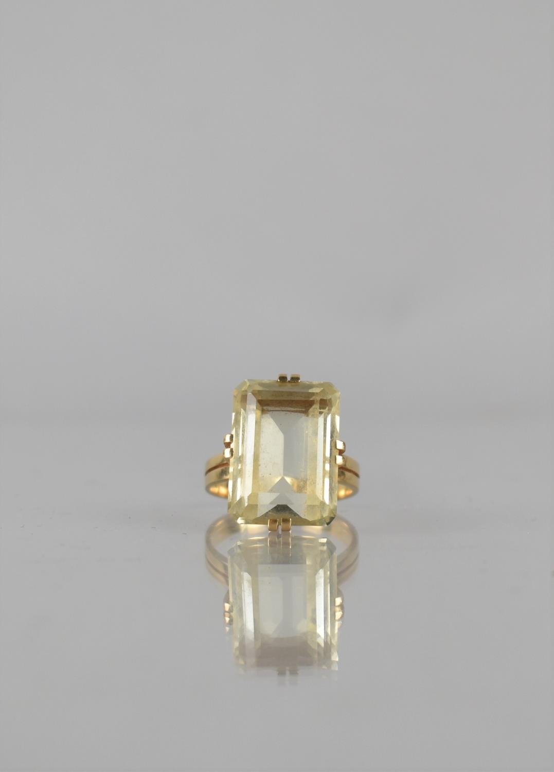 A European 14ct Gold and Citrine Dress Ring, Emerald Cut Stone Measuring 19mm by 13mm Approx and