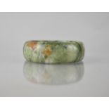 A Large Green Stone Jade Carved Bangle, 25mm Wide and 69mm Internal Dimensions, 102.8gms
