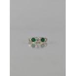 A Vintage 9ct Gold Ladies Boat Ring Comprising Five Round Brilliant Cut Green and White CZ Stones,