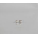 A Pair of Diamond Stud Earrings, Central Round Brilliant Cut Stone Approx 1mm Diameter, Illusion