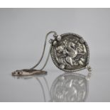 A Large White Metal Indian Pendant on Chain, Embossed Decoration, Possibly Depicting Ashwarooda
