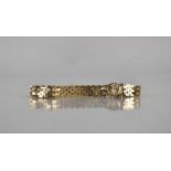 A 9ct Gold Textured Link Bracelet, One Textured Link to Clasp AF, 18.5cms Long and 9.5mm Wide,