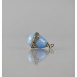 A Small Guilloche Enamelled and Silver Mounted Egg, Pale Blue Enamel with Stylised Ribbon Band,