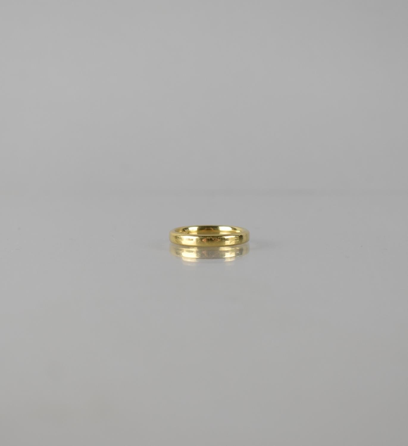 An 18ct Polished Gold Wedding Band, Court Shaped, Band Stamped for Birmingham, 750, Size M, Makers