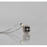 A Diamond and Sapphire Pendant, Centre Round Brilliant Cut Diamond Measuring 2mm Diameter, Claw