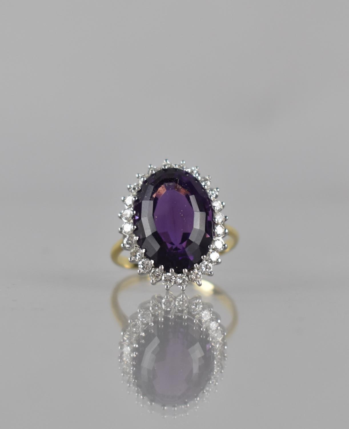 A Vintage 18ct Gold, Diamond and Amethyst Cocktail Ring, Central Oval Cut Stone Measuring Approx