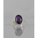 A Vintage 18ct Gold, Diamond and Amethyst Cocktail Ring, Central Oval Cut Stone Measuring Approx