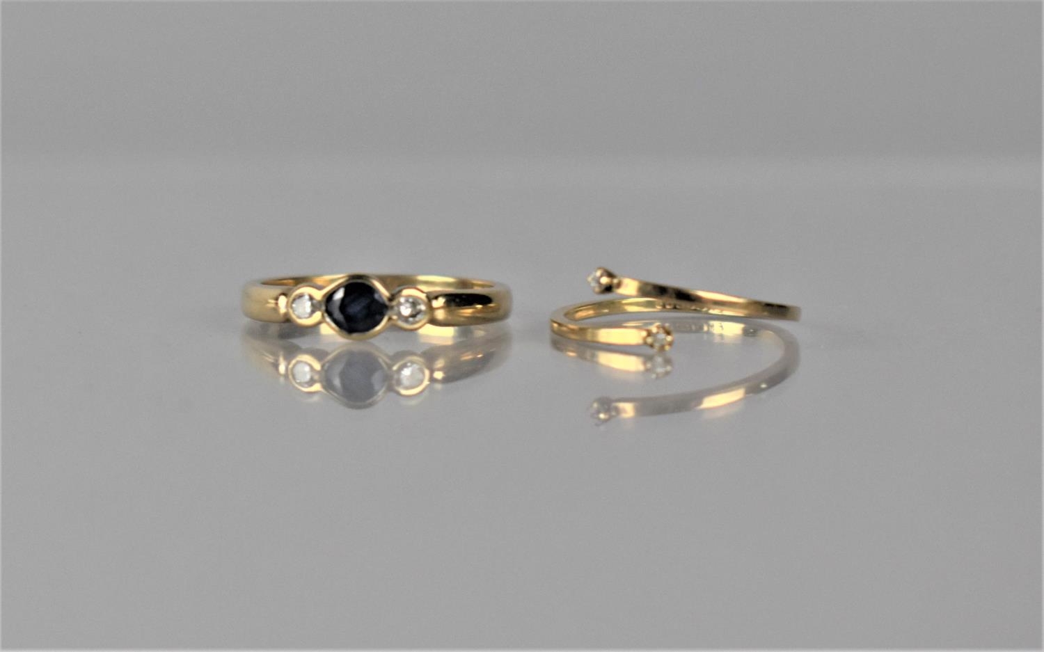 A Diamond and Sapphire 9ct Gold Mounted Ladies Dress Ring, Central Oval Cut Sapphire Measuring