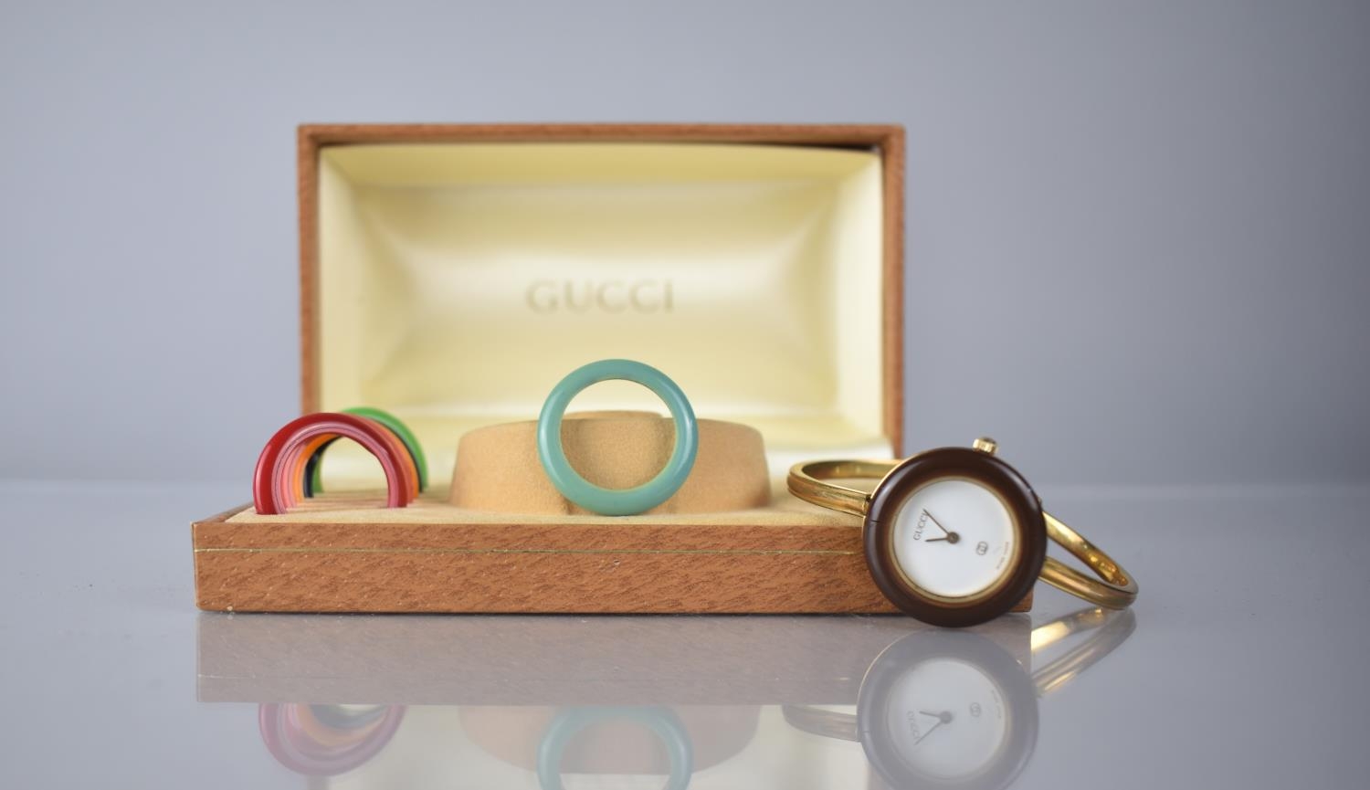 A Boxed Gucci Wrist Watch, White Enamel Dial Inscribed Gucci, Gold Coloured Hands, Interchangeable