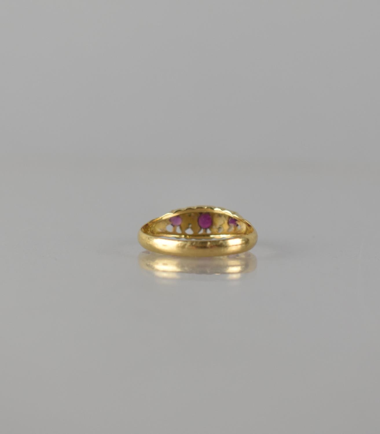 An 18ct Gold, Ruby and Diamond Seven Stone Boat Ring, Central Mixed Cut Ruby Measuring 3.5mm by - Bild 2 aus 3