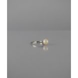 An Art Deco Pearl and Diamond Dress Ring, Central Ivory Pearl Measuring 8mm Diameter and 8mm Tall