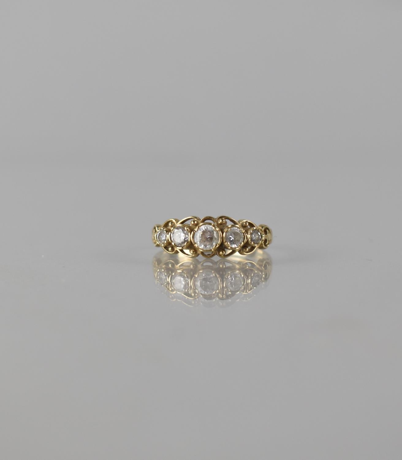 A 9ct Gold and White Stone Cannetille Style Ladies Five Stone Ring, Central Stone Measuring Approx