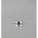 A Silver and Amethyst Ring, Cabochon Amethyst 3.5mm Diameter, in Collet Setting to a Heavy Hand