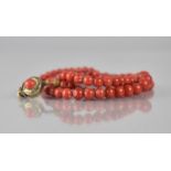 A 19th Century Graduated Red Coral Necklace, Largest Spherical Bead 7mm Diameter on a Gold Metal