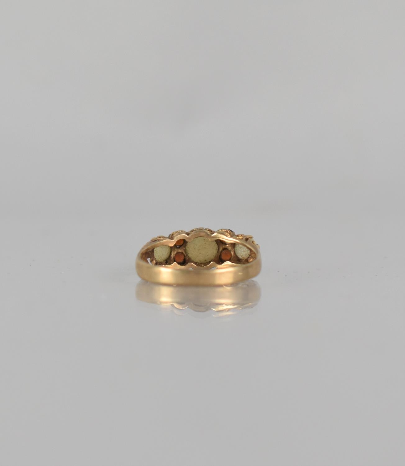 A 9ct Gold, Opal and Garnet Dress Ring, Centre Round Cabochon Opal Measuring 5mm Diameter, Claw - Bild 2 aus 3