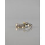 Two Modern 9ct Gold and CZ Ladies Dress Rings to include Seven Round Brilliant Cut Stone Example,