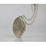 A Large Silver Photo Locket on Chain, Locket with Engraved Swirling Decoration and Measuring