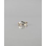 An Early 20th Century 9ct Gold and Platinum Mounted Three Stone Diamond Ring, Central Round Cut