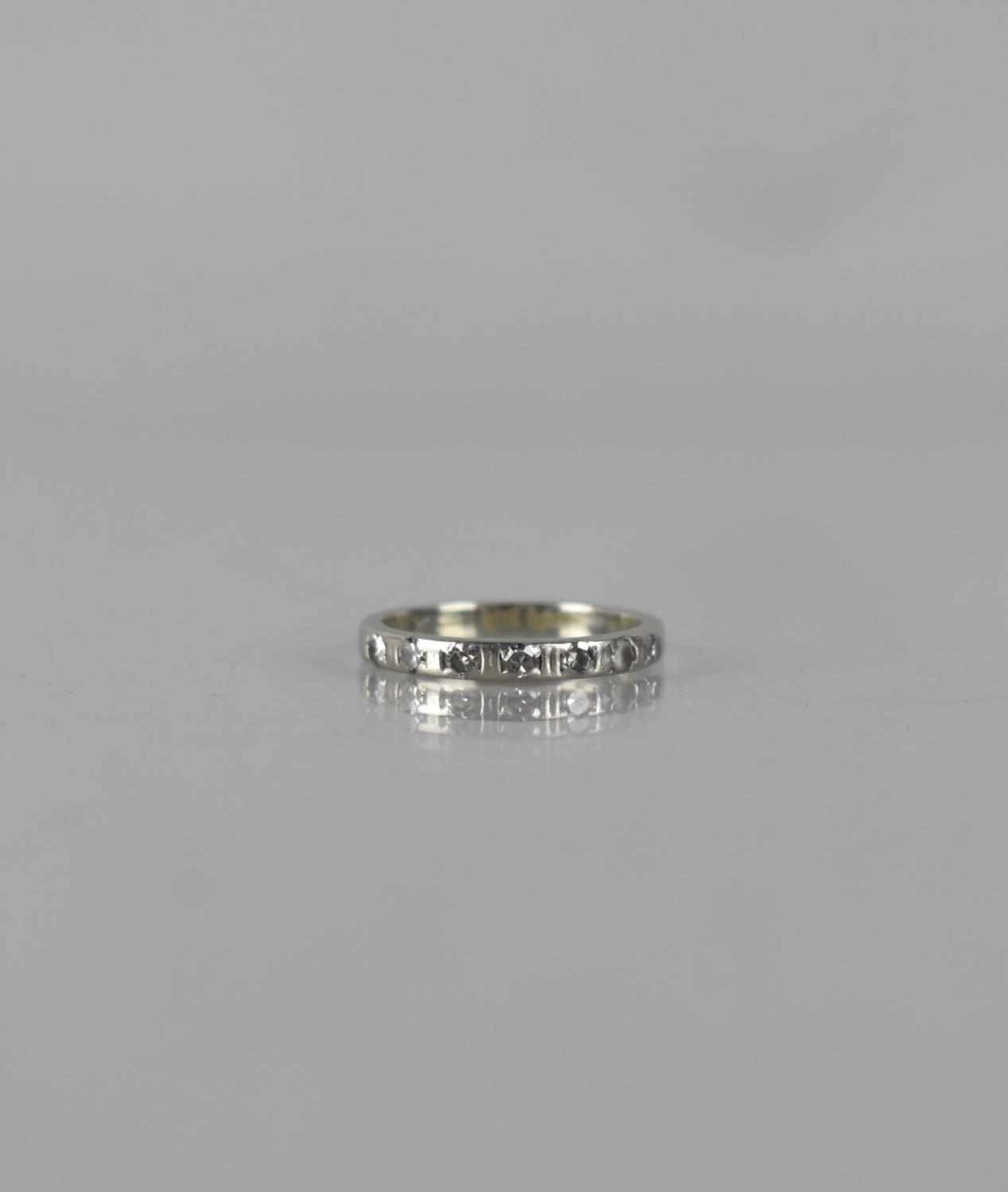 An Early 20th Century 18ct Gold and Diamond Mounted Half Eternity Ring, Seven Old Round Cut Stones