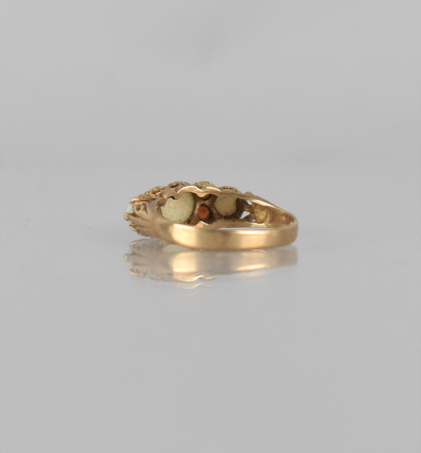 A 9ct Gold, Opal and Garnet Dress Ring, Centre Round Cabochon Opal Measuring 5mm Diameter, Claw - Bild 3 aus 3