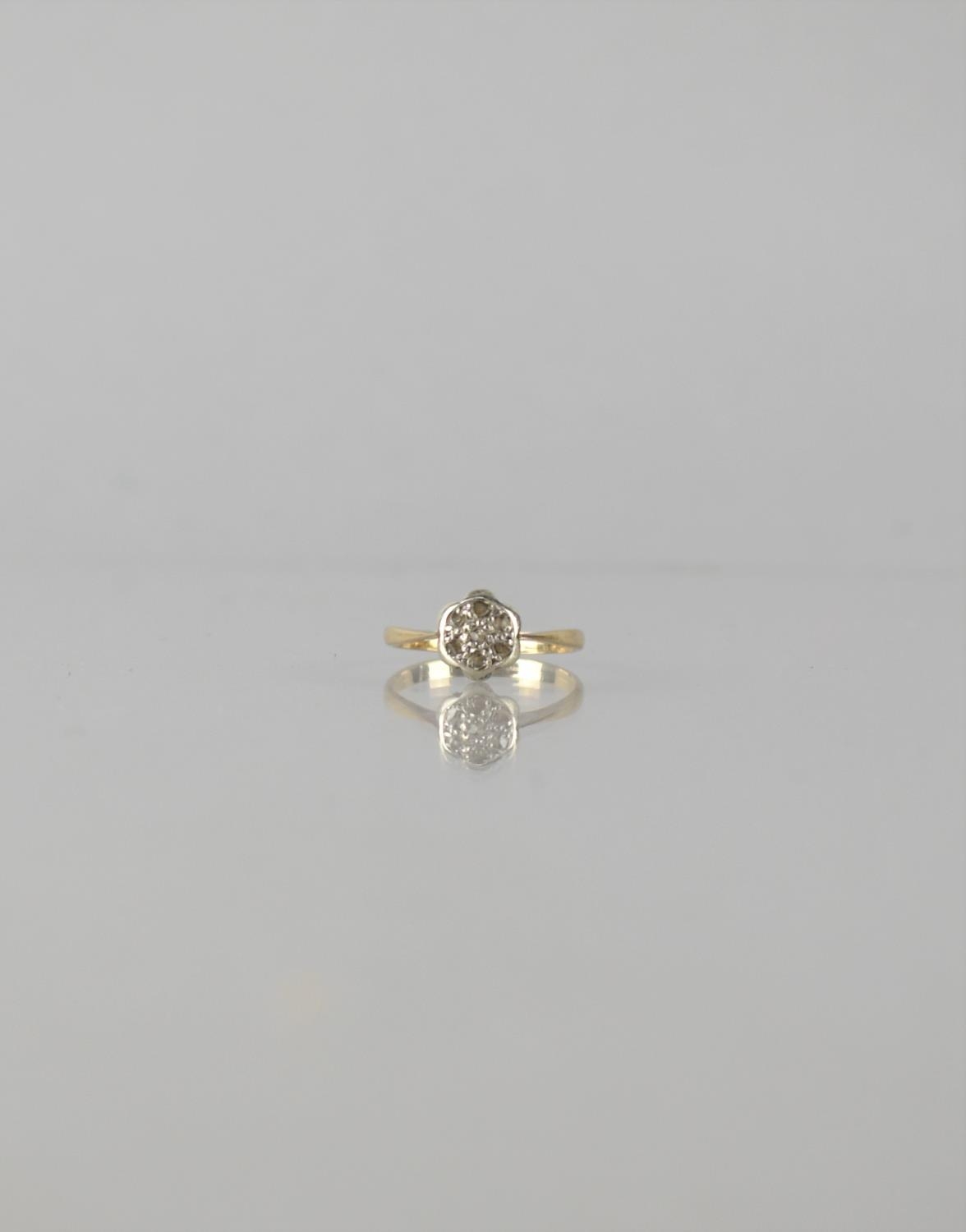 An Early 20th Century 9ct Gold and Diamond 'Daisy' Ring, Seven Asymmetric Rose Cut Diamonds