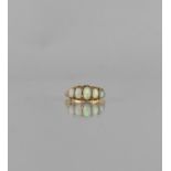 An Antique 18ct Gold and Five Stone Opal Ring, Centre Oval Cut Stone Measuring 5mm by 3mm, in Six