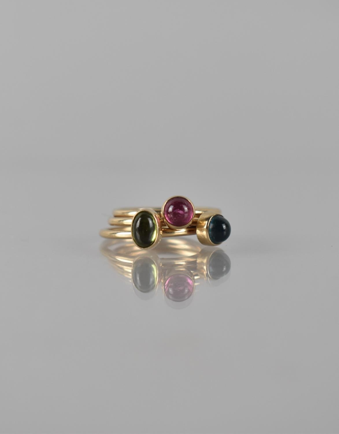 A Set of Three 9ct Gold Stacking Rings, Cabochon Stones Each Bezel Set on a Raised Head to a