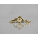 A Vintage Ladies Tudor Wrist Watch, Radiant Fluted Champagne Dial with Gold Coloured Alpha Hands and