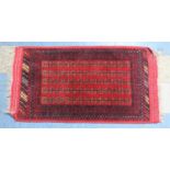 A Vintage Patterned Rug, Geometric Pattern on Red Ground, 147x78cm