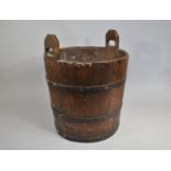A Cylindrical Coopered Log Box with Two Carrying Handles, 43cms Diameter and 52cms High