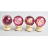 A Set of Four Vintage Bakelite Globular Finials, Decorated Internally with Flowers, Each 8.5cms Long