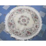 A Chinese Circular Woollen Rug on Cream Ground, 155cm Diameter