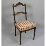 An Edwardian Bedroom Chair with Carved Back in the Aesthetic Style with Reeded Columns and Bow
