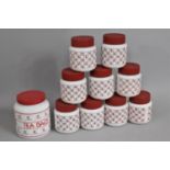 A Collection of Various Vintage Opaque Glass Storage Jars with Red Screw Lids