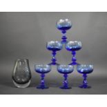 A Collection of Six Blue Glass Couped Glasses together with a Late 20th Century Blue Glass Vase