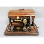 A Vintage Cased Jones Manual Sewing Machine