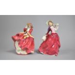 Two Royal Doulton Figures, Autumn Breezes (HN1934) and Top o' the Hill (HN1937)