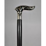 A Modern Ebonized Walking Cane with White Metal Mounted Handle