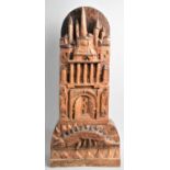 A Carved Wooden Study of a Medieval Tower with Dragon Before, Signed Soudani, 45cms High