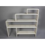 A Mid 20th Century White Painted Stepped Five Shelf Open Book or Display Shelf, 116cm wide