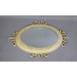 A Cream Painted Metal Framed Oval Wall Mirror, c.1950, 109cm high